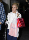 th_33527_celebrity-paradise.com-The_Elder-Ashley_Tisdale_2009-12-16_-_Christmas_shopping_at_the_Beverly_Center_148_122_86lo.jpg